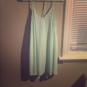 Mint green dress with detailed back. Lush brand